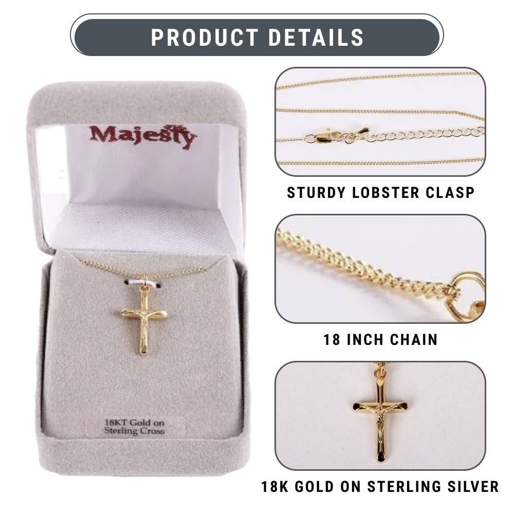 Gold cross necklace in a 'Majesty' branded box with product details on a white background.