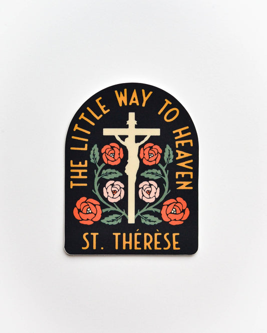 Decorative plaque with cross, roses, and text 'The Little Way to Heaven St. Therese' on a white background