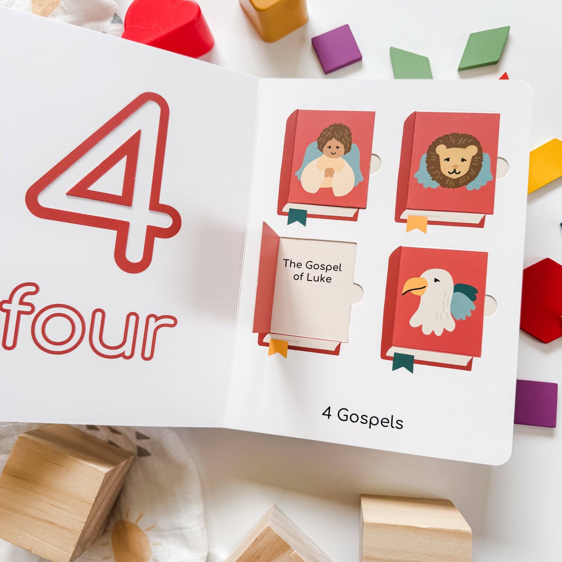 Educational card with number '4' and illustrations of books, surrounded by colorful blocks.