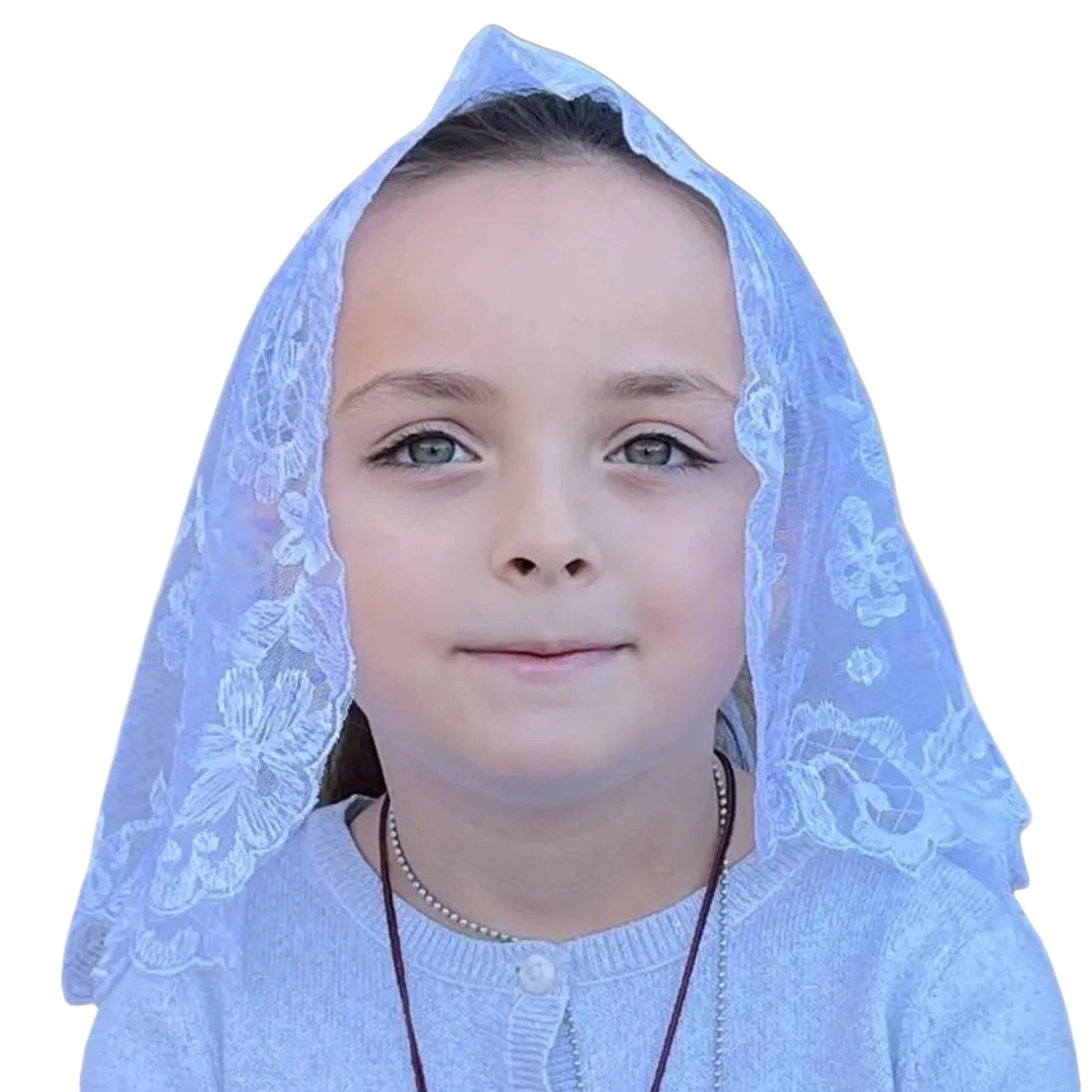 Young girl wearing a white lace veil on a white background