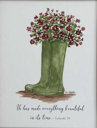 Framed artwork of a green boot with flowers on a beige wall
