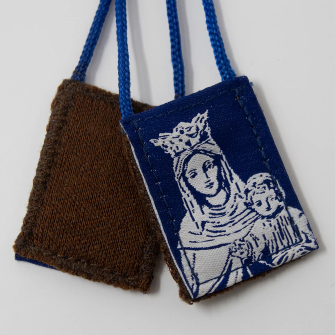 Blue scapular with brown background of Our Lady of Mount Carmel