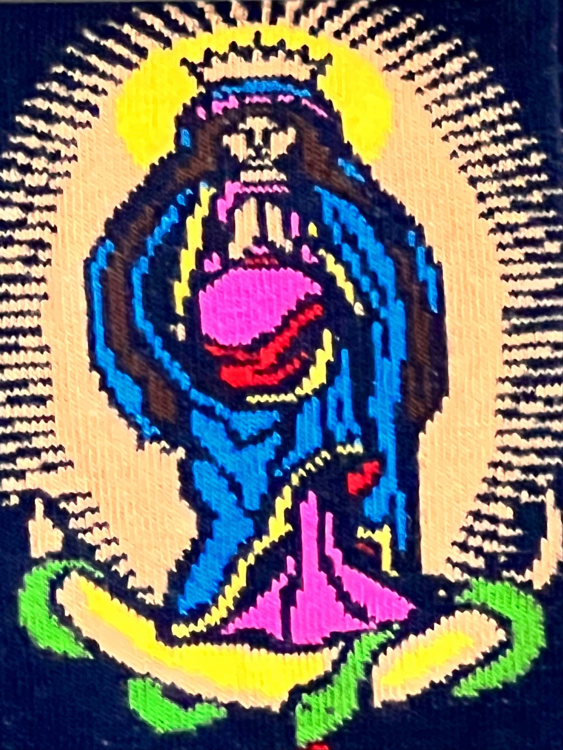 Colorful pixelated depiction of a religious figure with a bright yellow halo on a dark background.