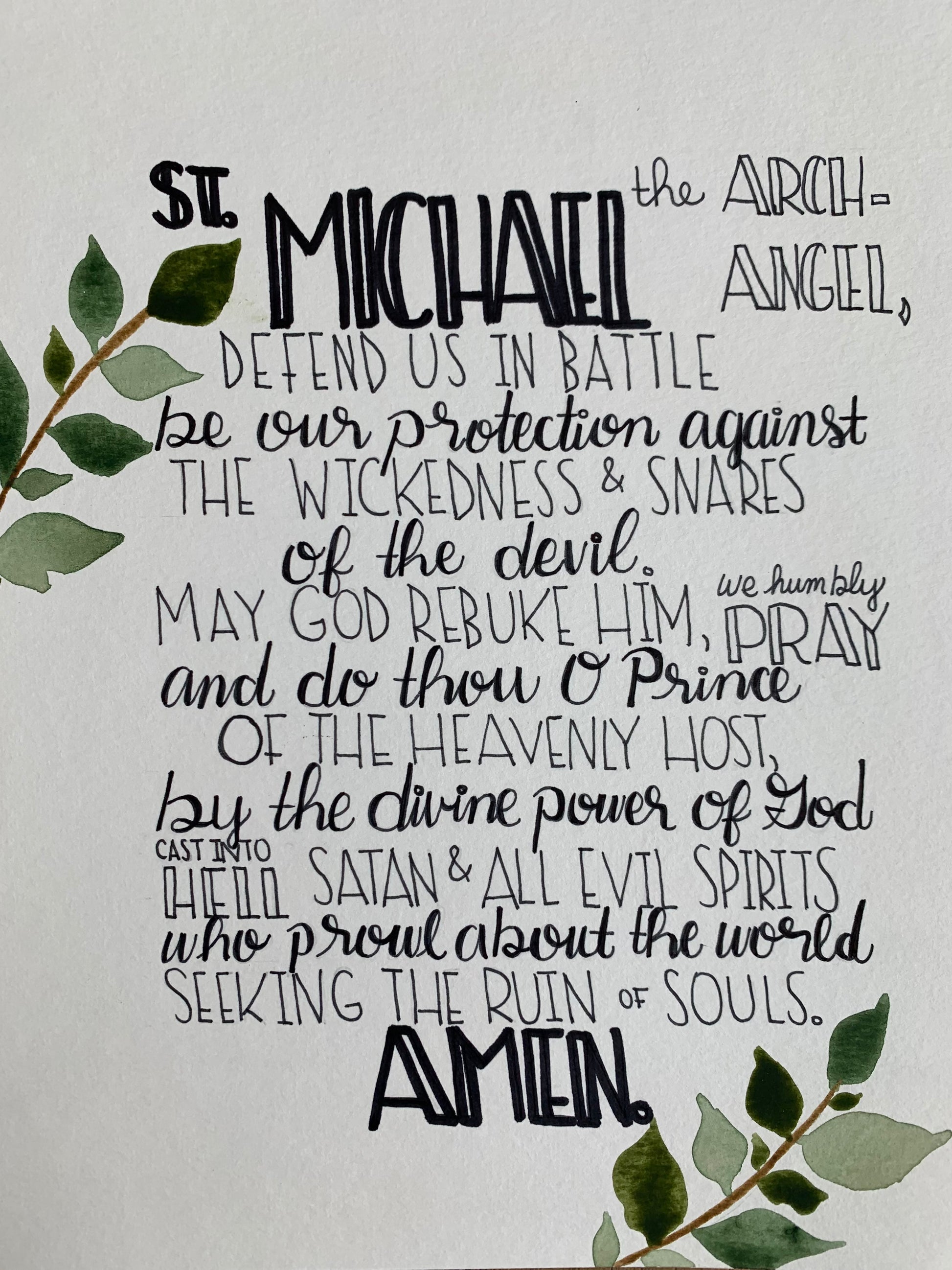St. Michael the Archangel, on a light background with green leaves.