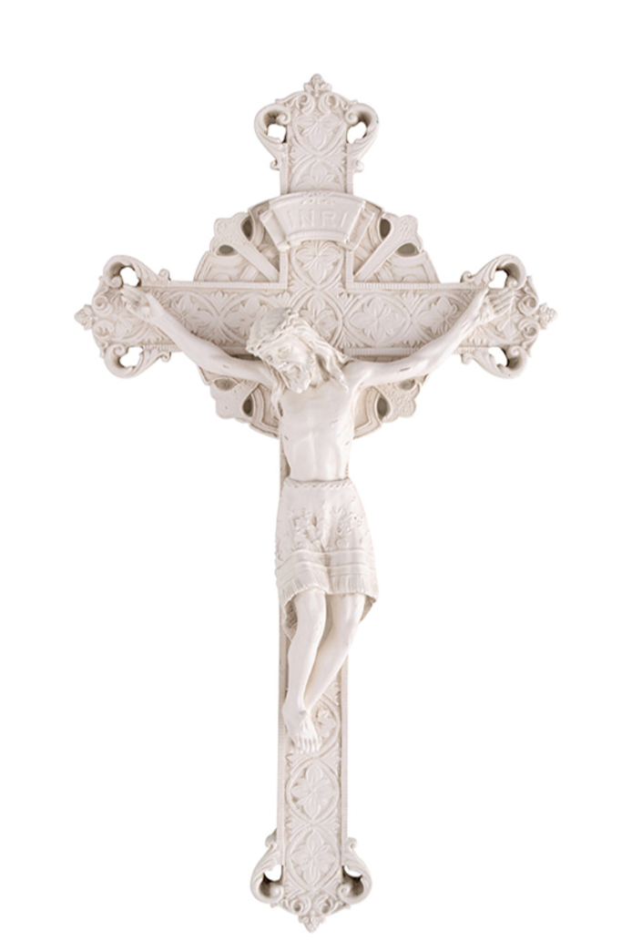Whitewashed wall crucifix