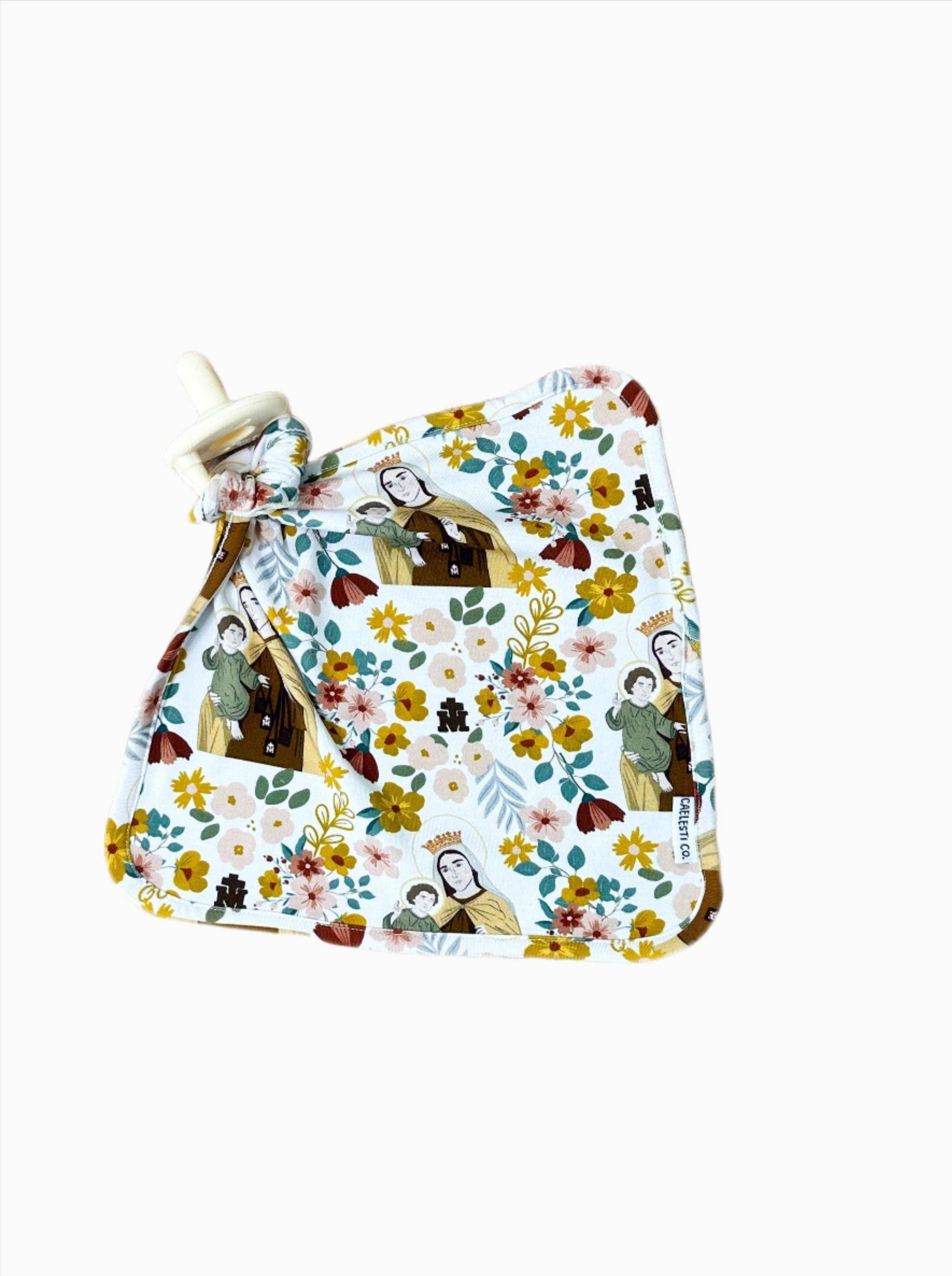 Fabric with floral and character print on a white background