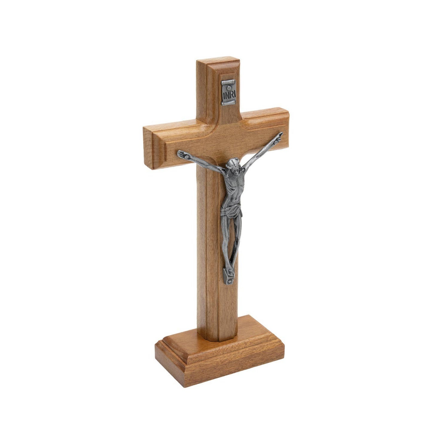 Wooden cross with silver Jesus figure on a white background