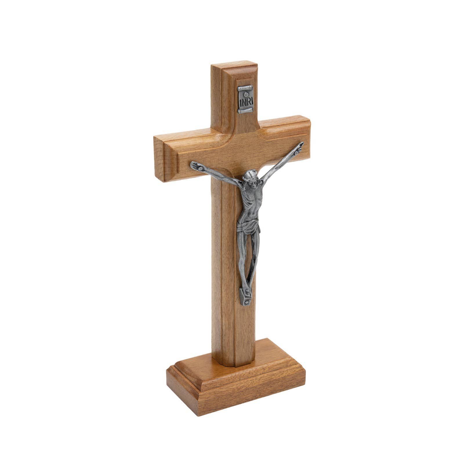 Wooden cross with silver Jesus figure on a white background