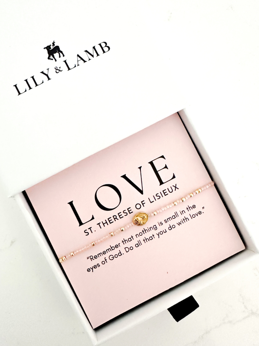 Pink jewelry box with 'LOVE' and text, featuring Lily & Lamb branding.