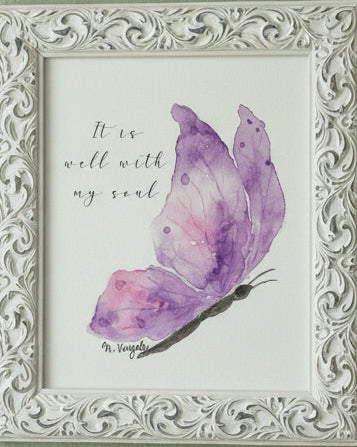 Framed artwork with a purple butterfly and text on a green wall