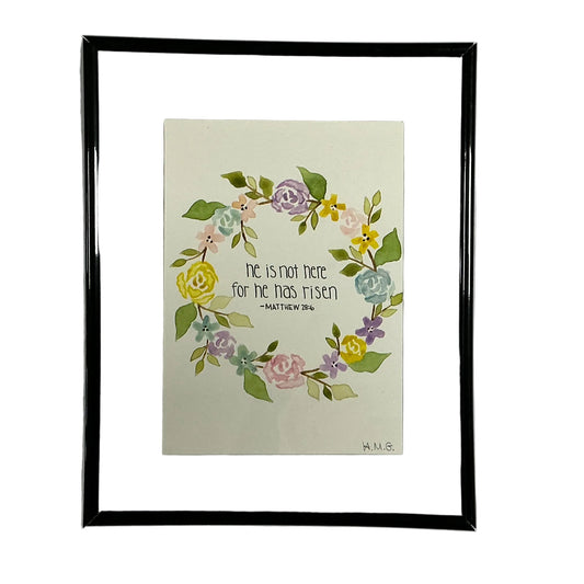 Framed artwork with floral design and text on a white background