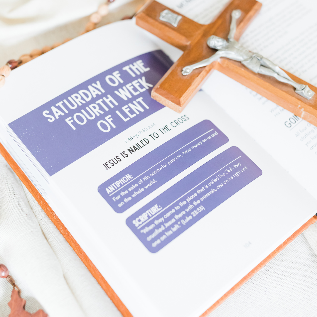 Open page with religious text on a white surface