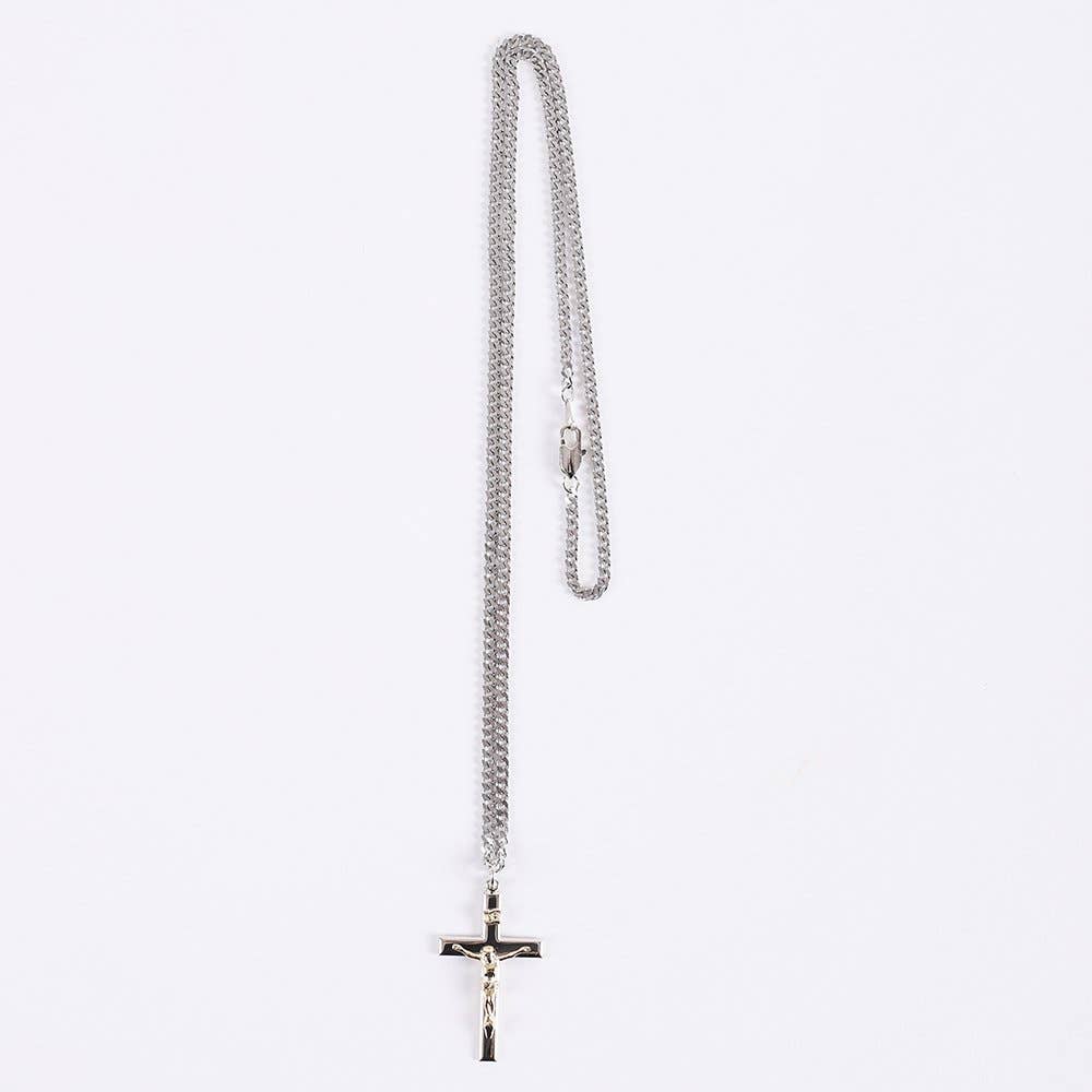 Silver chain necklace with a cross pendant on a white background