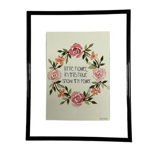 Framed artwork with floral design and text on a white background