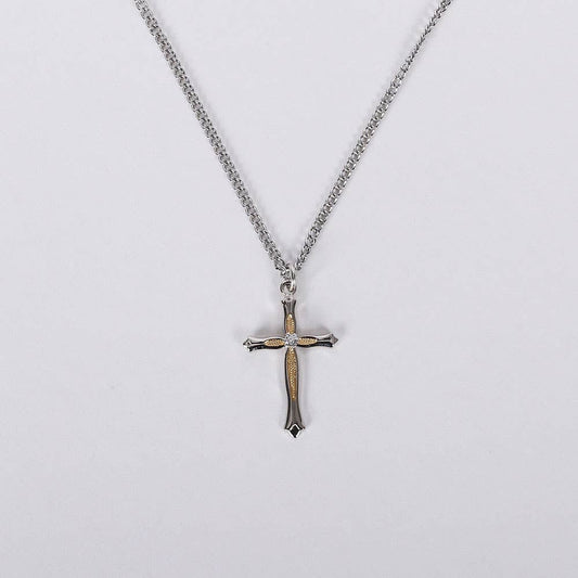 Cross pendant necklace on a light gray background