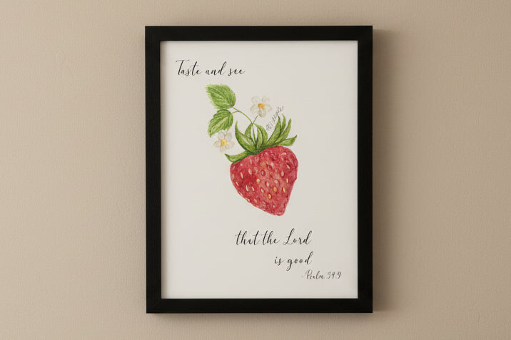 Framed print with a strawberry illustration and text.