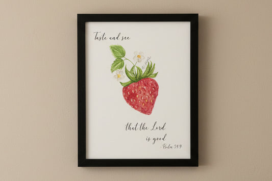 Framed print with a strawberry illustration and text.