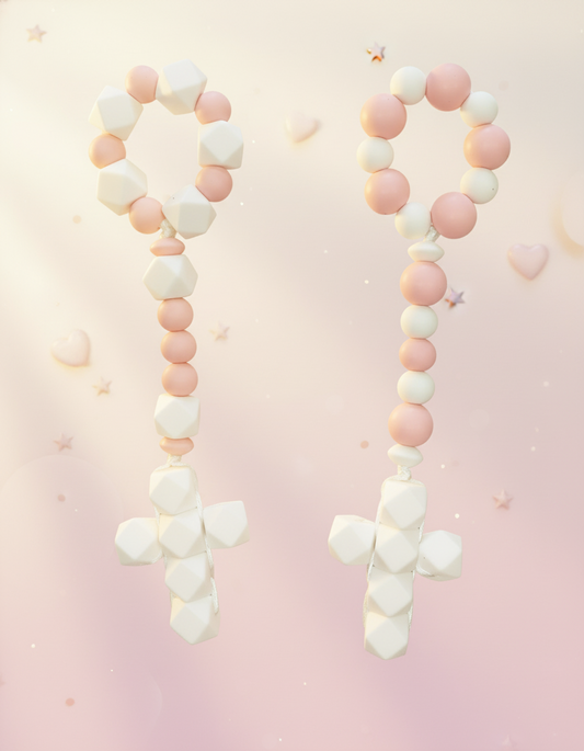 Pink silicone baby teethers