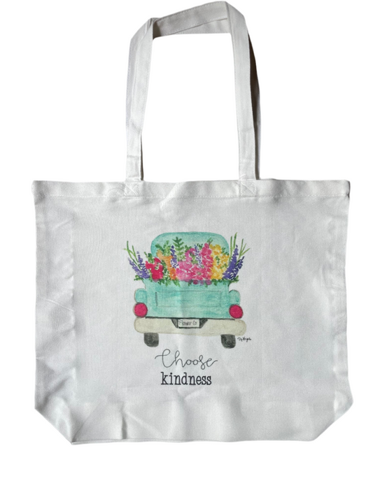 Tote bag with a truck and flowers design and 'Choose kindness' text on a white background