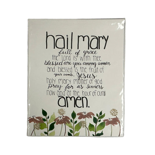 White with printed design on a gray surface