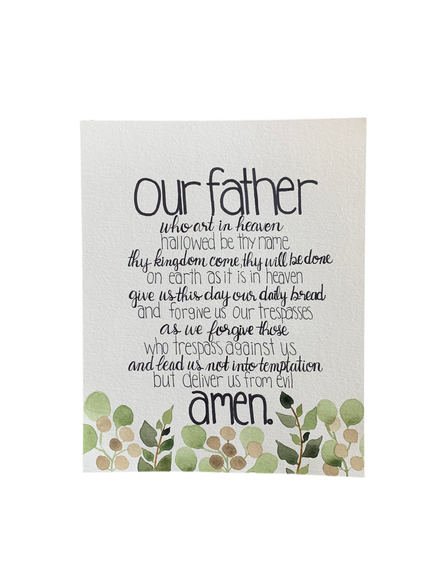 Plaque with the Lord's Prayer text and green leaf design on a white background
