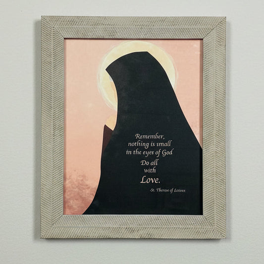 Framed artwork with silhouette and inspirational quote on a grey wall