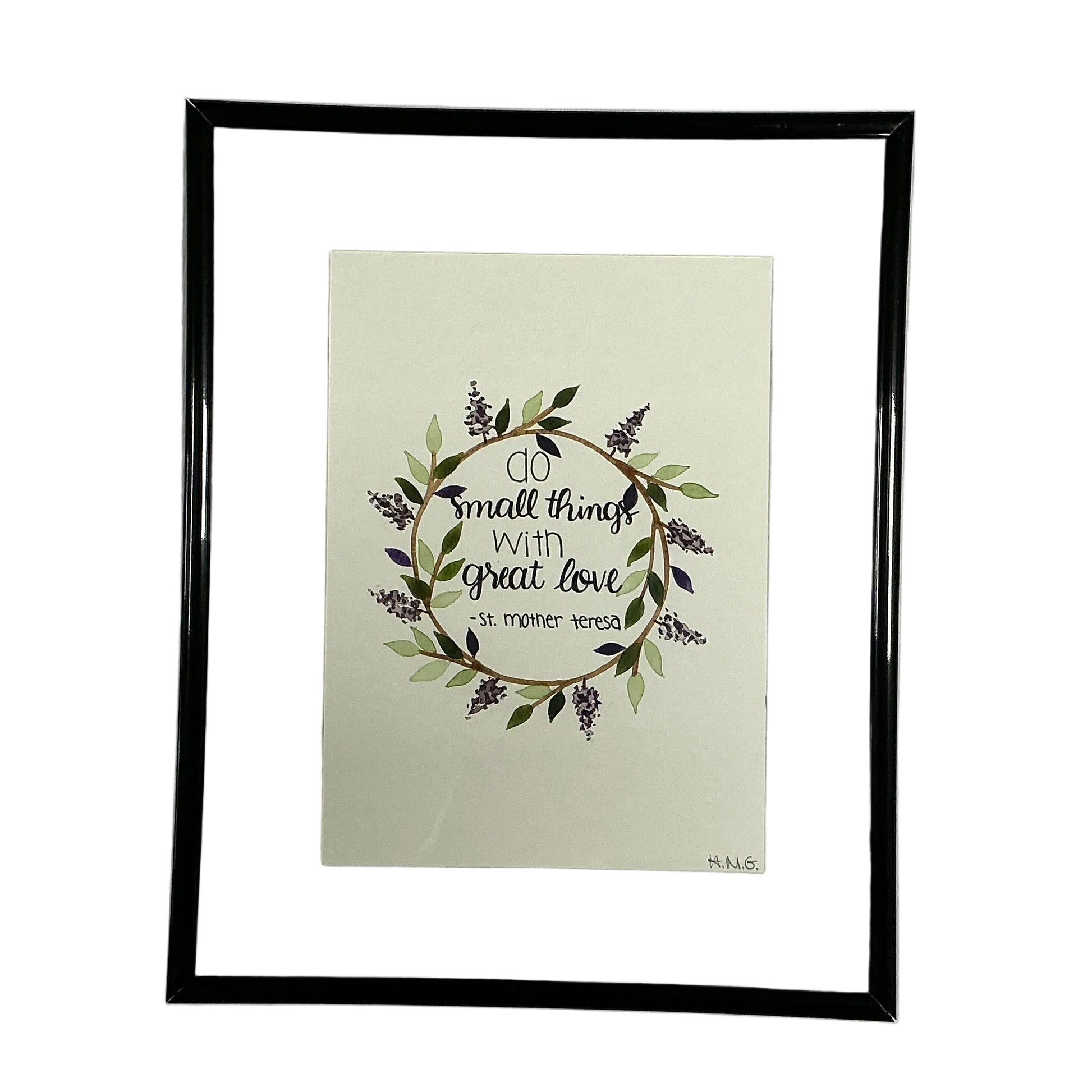 Framed artwork with decorative text and floral design on a light background