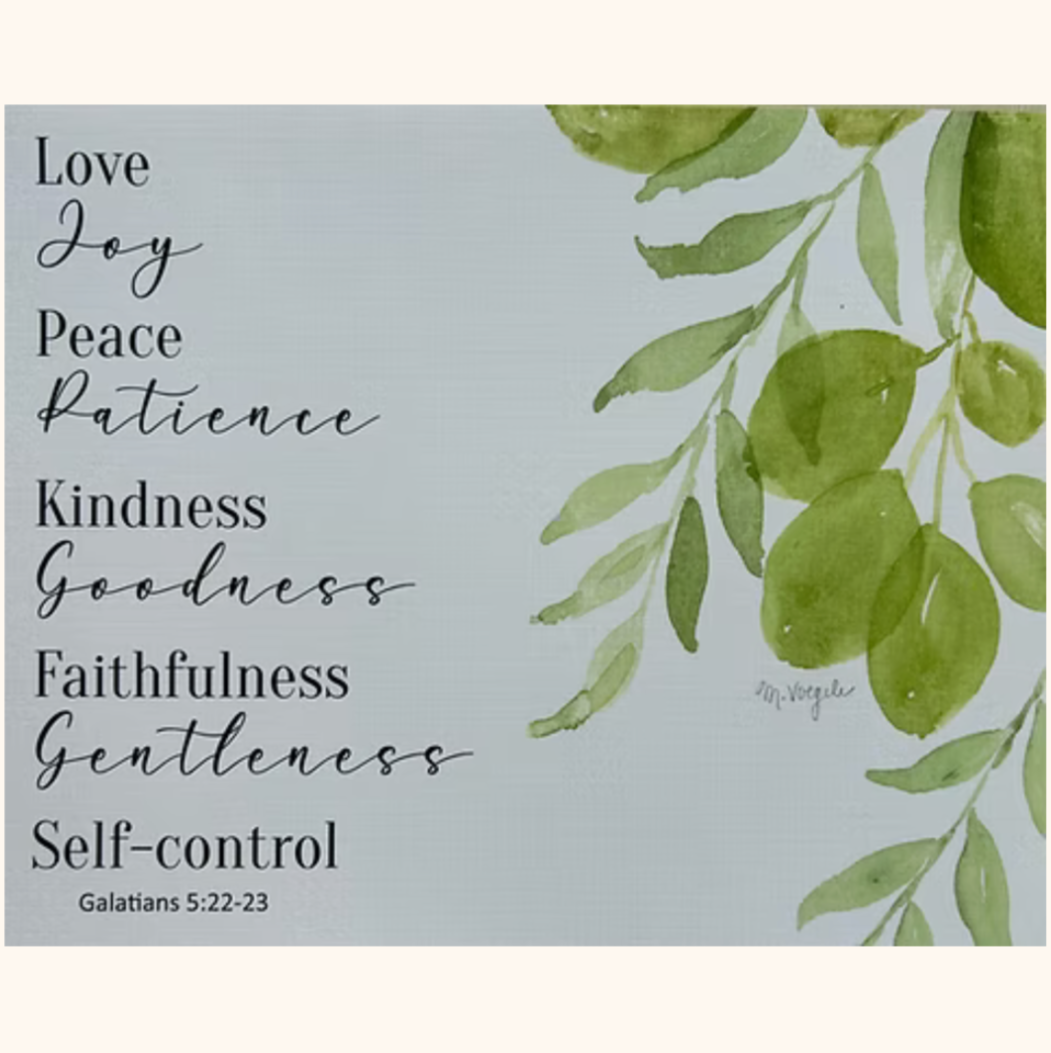  'Fruits of the Spirit' with green leaves on a gray background