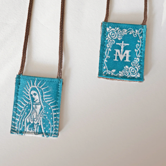 Scapulars with a blue background and brown straps.