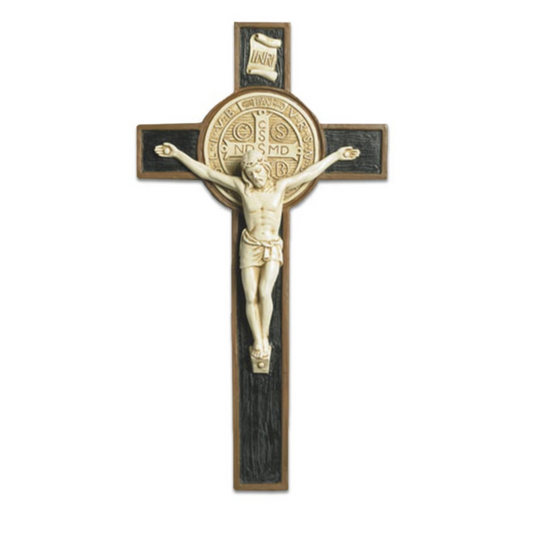 Wooden cross with a figure of Jesus on a white background