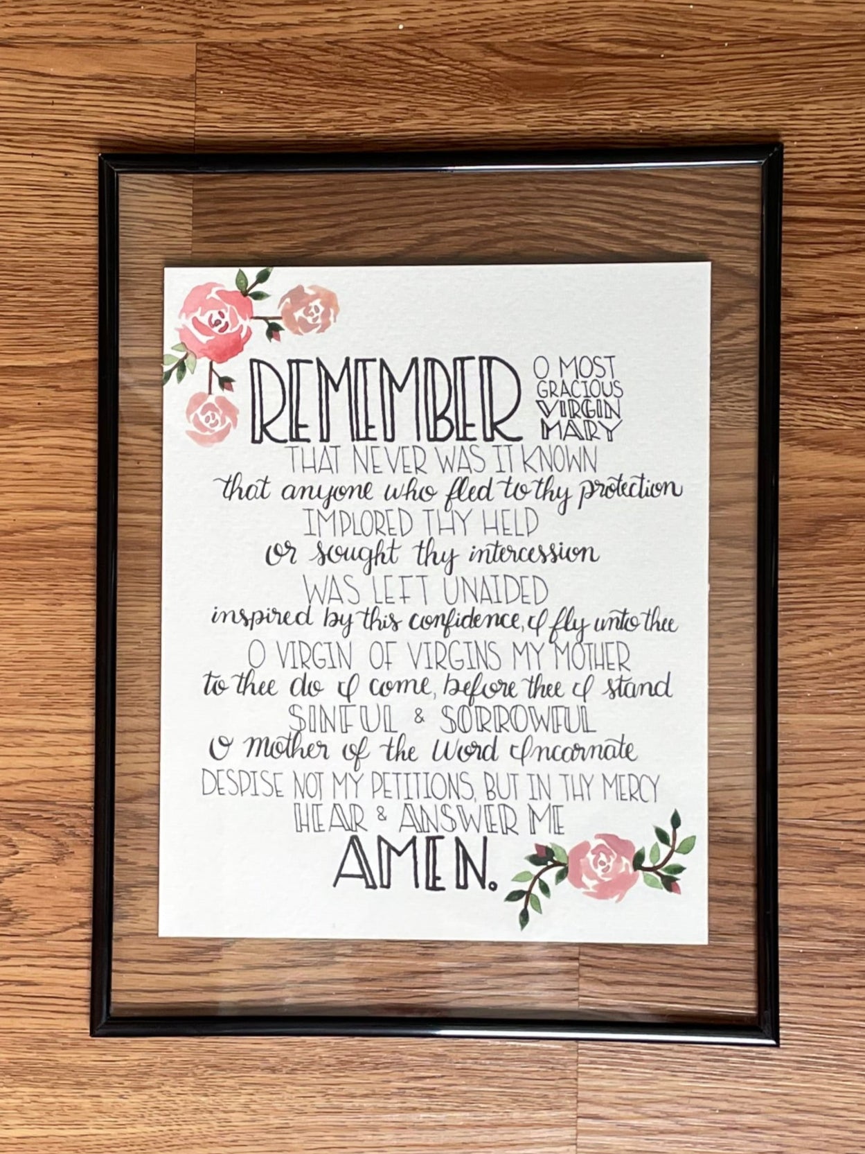 Framed print on a wooden wall