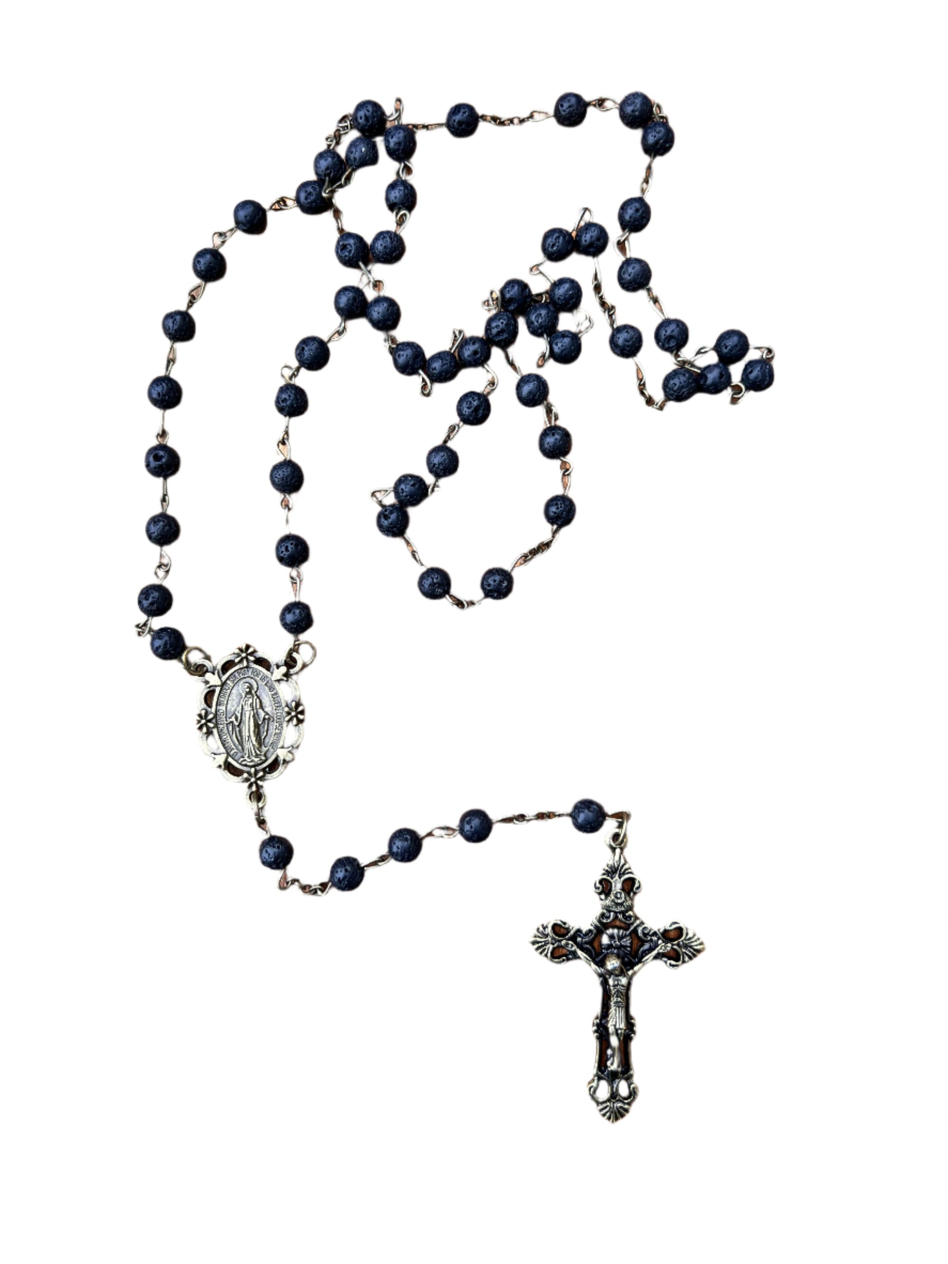 Black rosary with silver crucifix and  miraculous medal on a white background