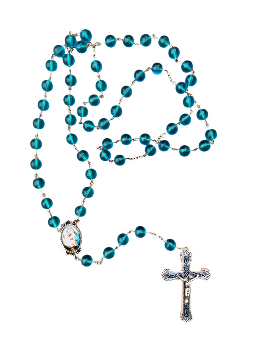 Blue rosary with a cross on a white background