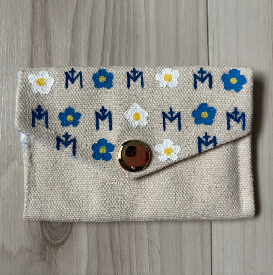 Textile pouch with floral and Marian patterns 