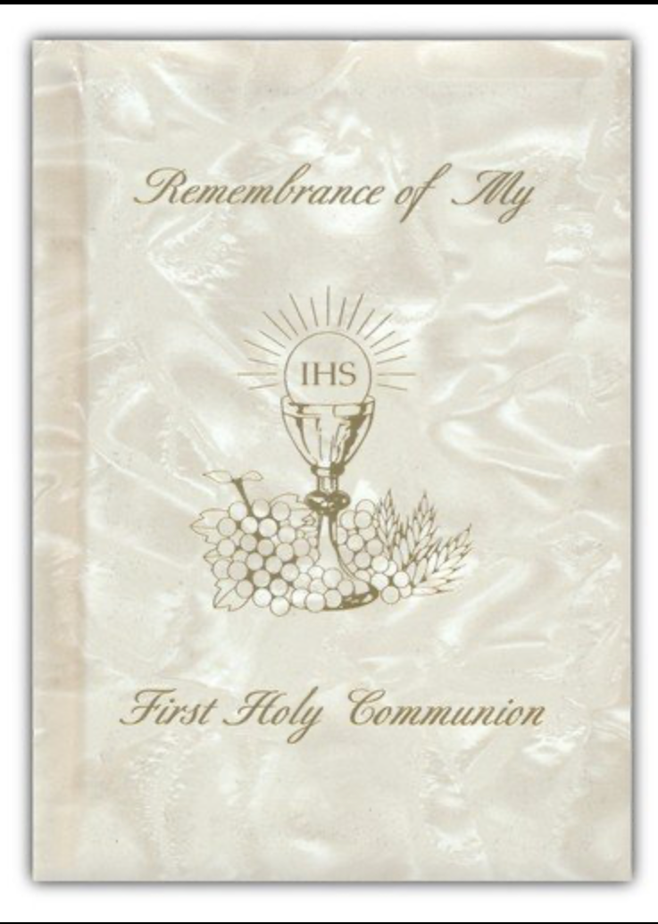 First Holy Communion book with chalice and grapes design on a textured beige background