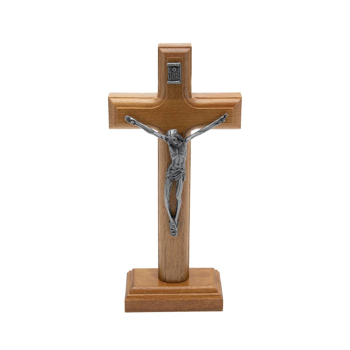 Wooden cross with silver Jesus figure on a white background