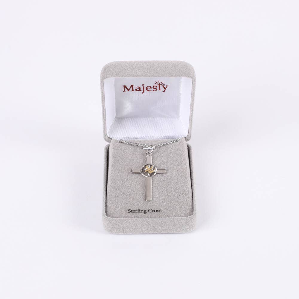 Silver cross necklace in a Majesty jewelry box on a white background