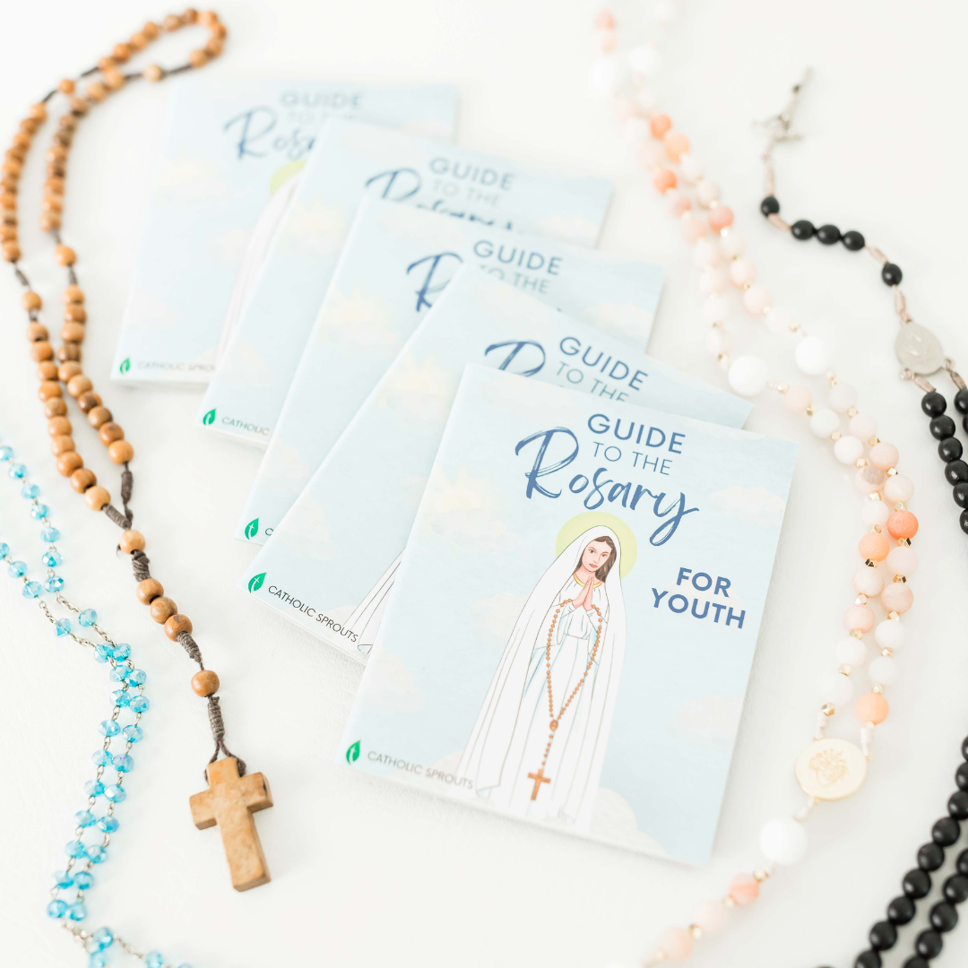 Guide to the Rosary for youth with rosary beads on a white background